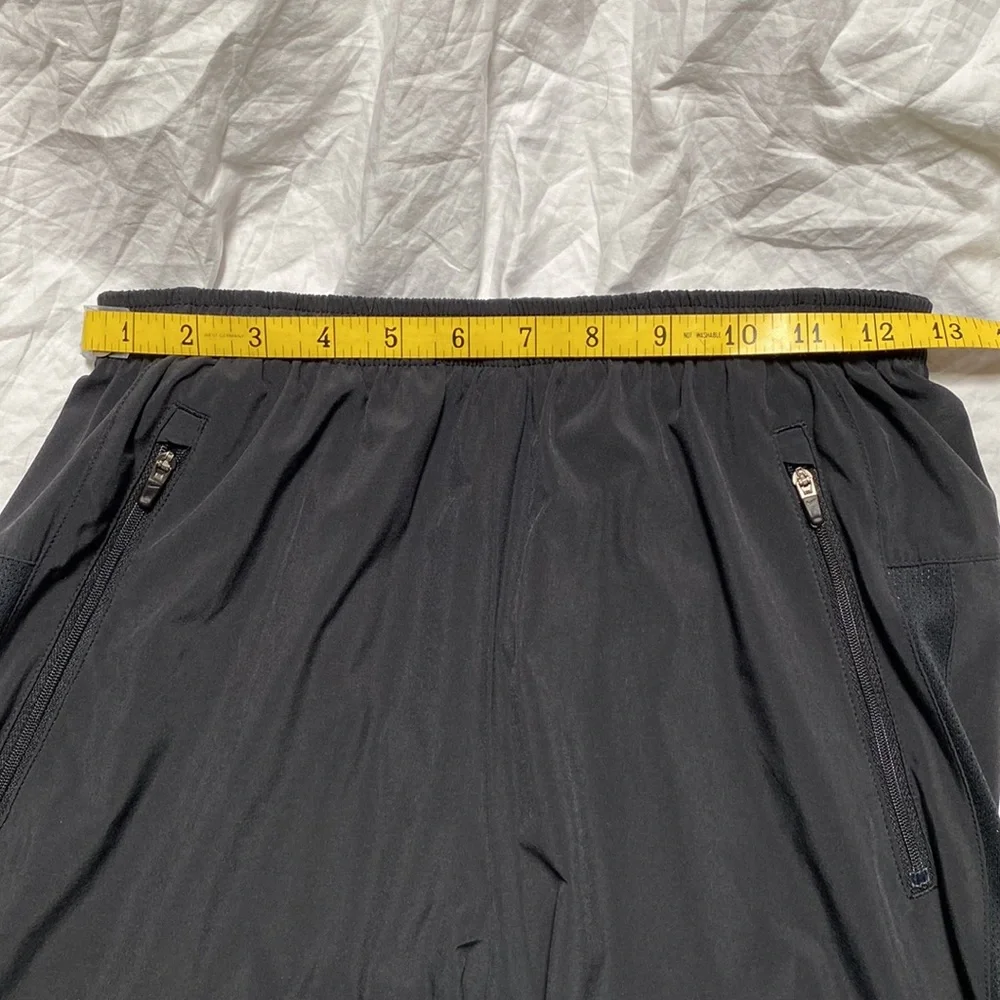 Nike Men’s Dri-Fit black running joggers. Size small.
